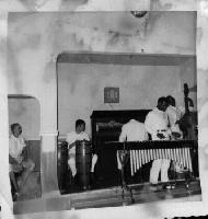 photo 1962 Latin Jazz Quintet + One (L-R: Joyce Zavaleta sitting in on bongos, Califa (congas)